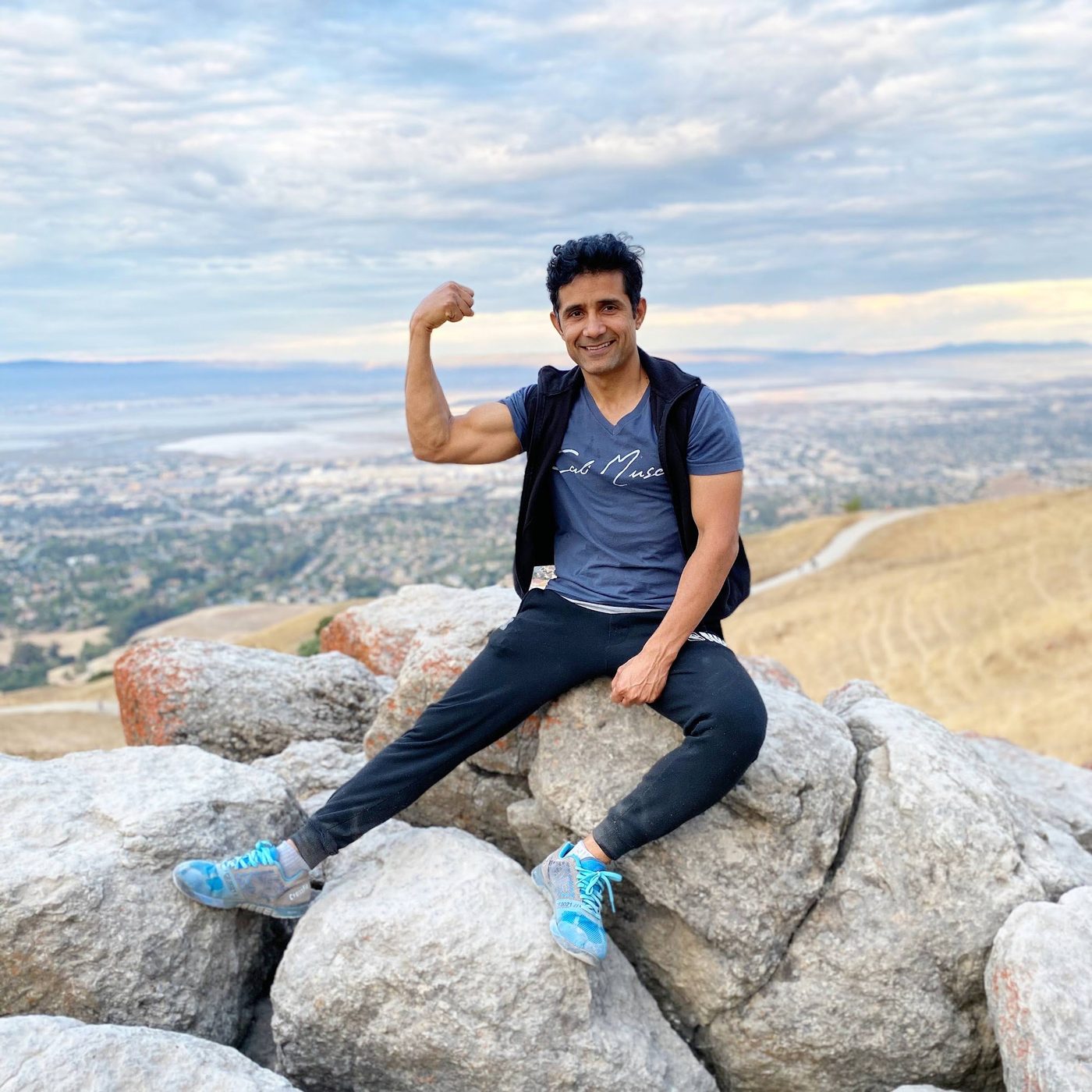 Coach Manjeet on a mountaintop overlooking the Bay Area