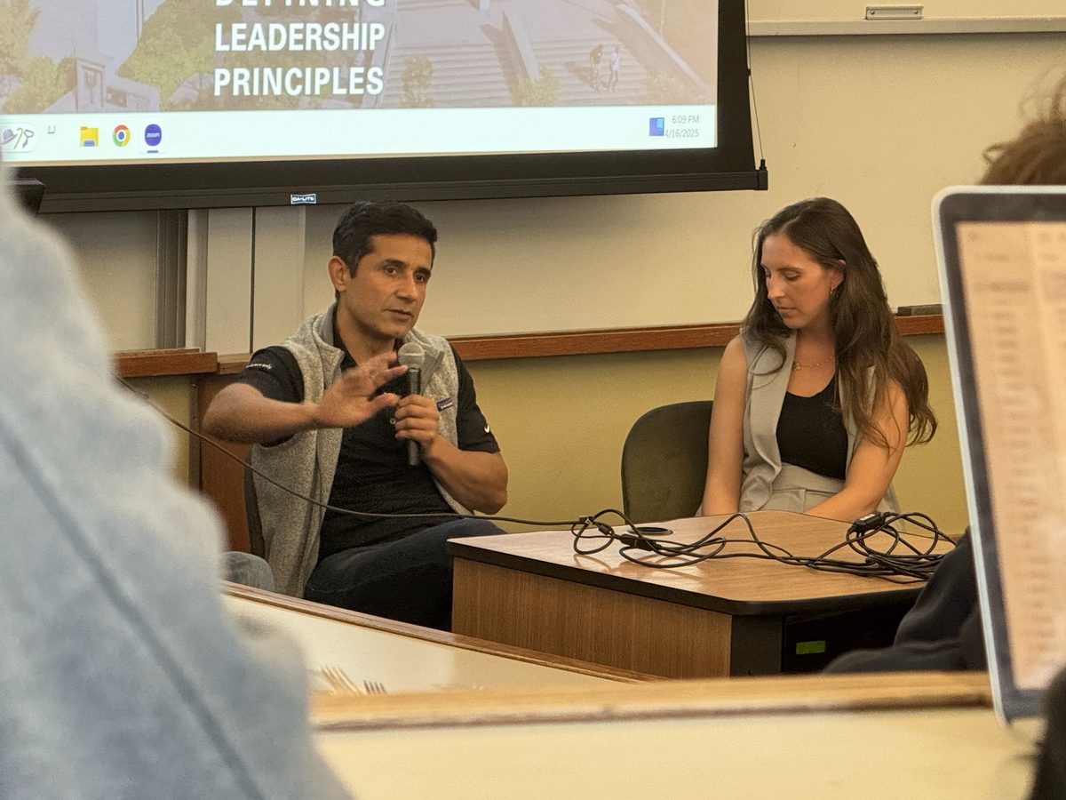 Coach Manjeet speaking on a panel about leadership principles